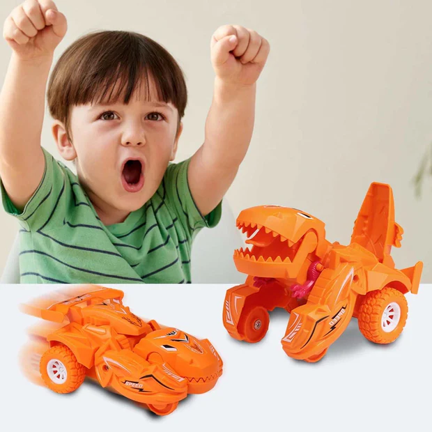 Child with arms raised next to two orange toy vehicles on a white backgroundshop_this_look_AVdw3f